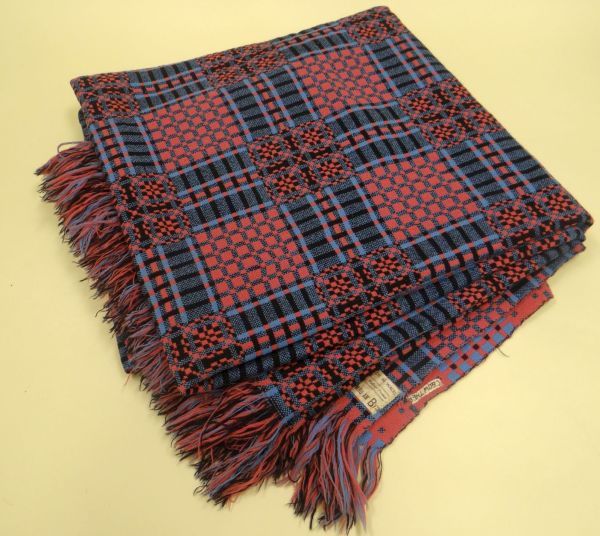 A WELSH WOOL BLANKET in multi-coloured chequer design, 217 x 202cms