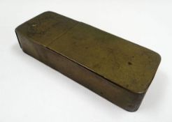 A NINETEENTH CENTURY BRASS TOBACCO BOX of rounded rectangular form and with two compartments, the