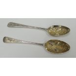 A PAIR OF GEORGE III SMALL SILVER BERRY SPOONS chased with heraldic terminals and floral stems and