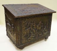 A LARGE SLOPED METALLIC COAL BOX having all round repoussé work all round