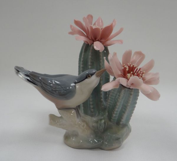 A BOXED LLADRO FIGURE OF A BIRD ON A CACTUS, 13cms high