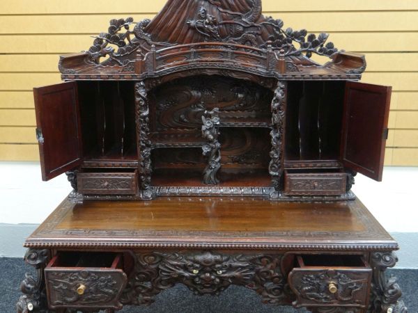 A JAPANESE MEIJI CARVED DESK with cabinet and recess top and base of two drawers, heavily carved - Image 3 of 6