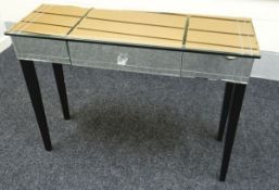 A MODERN GLASS CONSOLE TABLE with single drawer and tapered legs