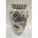 A CHARLOTTE RHEAD DRAGON DECORATED VASE for Bursley Ware, model TL65, 32cms high