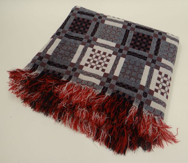 A DYFFRYN WELSH WOOL BLANKET of large size, in pink ground with blue, black and green chequer