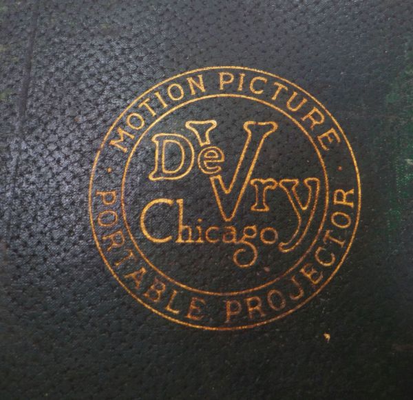 A DEVRY CHICAGO MOTION PICTURE PORTABLE PROJECTOR in a green leather effect case Provenance: from - Image 3 of 3