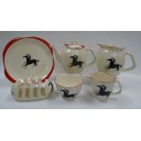 A BESWICK BREAKFAST SET comprising teapot, milk-jug, cream-jug, plate and sugar-basin, with stylised