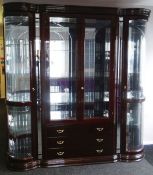 A MODERN LARGE STANDING FOUR DOOR DISPLAY CABINET Italian made in pseudo mahogany having a pair of