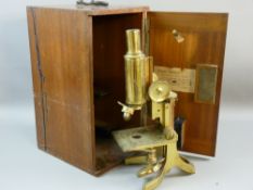 AN ALL BRASS SWIFT & BECK MICROSCOPE with no supplementary lenses in a mahogany case