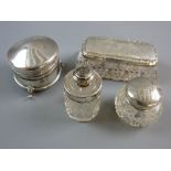 A CIRCULAR SILVER VELVET LINED RING BOX on three pad supports, Birmingham 1913 (some impact