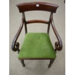 A VICTORIAN MAHOGANY ELBOW CHAIR with gently curved top rail, scrolled arms and turned front