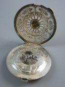 A LARGE EGYPTIAN WHITE METAL, POSSIBLY SILVER FILIGREE POWDER COMPACT with palm tree decorated