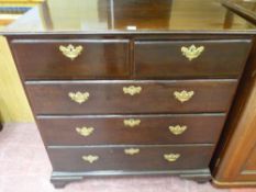 AN EARLY 19th CENTURY MAHOGANY CHEST of three long and two short drawers with brass lockplates and