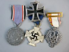 MEDALS - A WWI GERMAN IRON CROSS SECOND CLASS with three others, the 1914 Cross ringmarked, a Nazi