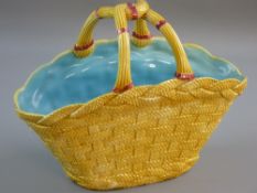 A LARGE OVAL COPELAND POTTERY WOVEN BASKET with intertwined centre handles, 31 x 16 cms
