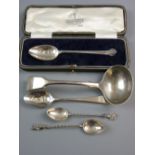 A CASED PRESENTATION SILVER SPOON, initialled 'J', a pair of apostle spoons with twist handles and