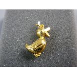 A NINE CARAT GOLD DUCK CHARM or pendant, 1 grm