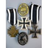 MEDALS - GERMAN WWI PAIR, A WWII Iron Cross first class and two wound badges, the 1914 Imperial Iron