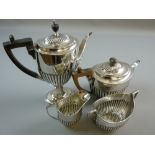 A FOUR PIECE SILVER TEA AND COFFEE SET each piece of oval form with half body fluted/plain