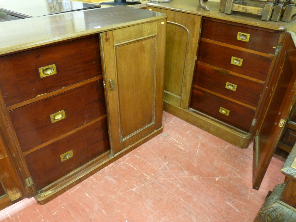 A NEAR PAIR OF 19th CENTURY MAHOGANY ENCLOSED STANDING CUPBOARDS, one having three long drawers with
