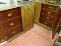 A NEAR PAIR OF 19th CENTURY MAHOGANY ENCLOSED STANDING CUPBOARDS, one having three long drawers with