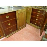 A NEAR PAIR OF 19th CENTURY MAHOGANY ENCLOSED STANDING CUPBOARDS, one having three long drawers with