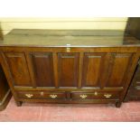 AN 18th CENTURY OAK DOWER CHEST with five fronted fielded panels and a pair of long narrow base