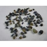 A PARCEL OF AUSTRALIAN SAPPHIRES, approximately 15.5 grms of uncut Australian sapphires,