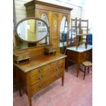 AN EDWARDIAN MAHOGANY AND INLAID BEDROOM SUITE comprising a three quarter wardrobe having a centre