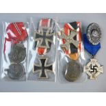 MEDALS - SEVEN THIRD REICH MEDALS AND A WOUND BADGE to include two 1941/42 Russian Front medals, two