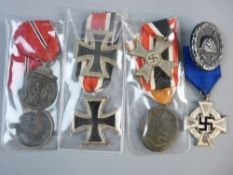 MEDALS - SEVEN THIRD REICH MEDALS AND A WOUND BADGE to include two 1941/42 Russian Front medals, two
