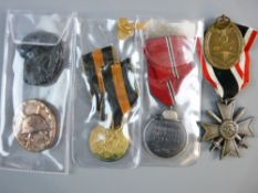 MEDALS - FOUR GERMAN THIRD REICH MEDALS AND TWO WOUND BADGES to include a 1941/42 Russian Front,