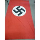 A LARGE GERMAN NAZI PARTY FLAG, 125 x 215 cms approximately