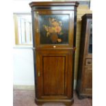 A WARING & GILLOW MAHOGANY AND CROSSBANDED ONE PIECE STANDING CORNER CUPBOARD having a stepped