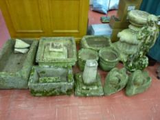 A LARGE MIXED PARCEL OF SANDSTONE GARDEN STATUARY including three naturalistic oblong troughs and