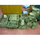 A LARGE MIXED PARCEL OF SANDSTONE GARDEN STATUARY including three naturalistic oblong troughs and