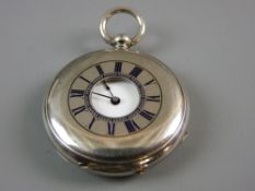 A CIRCA 1870 0.935 SILVER HALF HUNTER CYLINDER POCKET WATCH having a white enamel interior dial