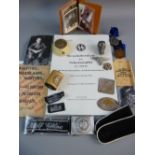 A COLLECTION OF GERMAN SS MEMORABILIA to include an office desk weight, an officer's cap eagle and