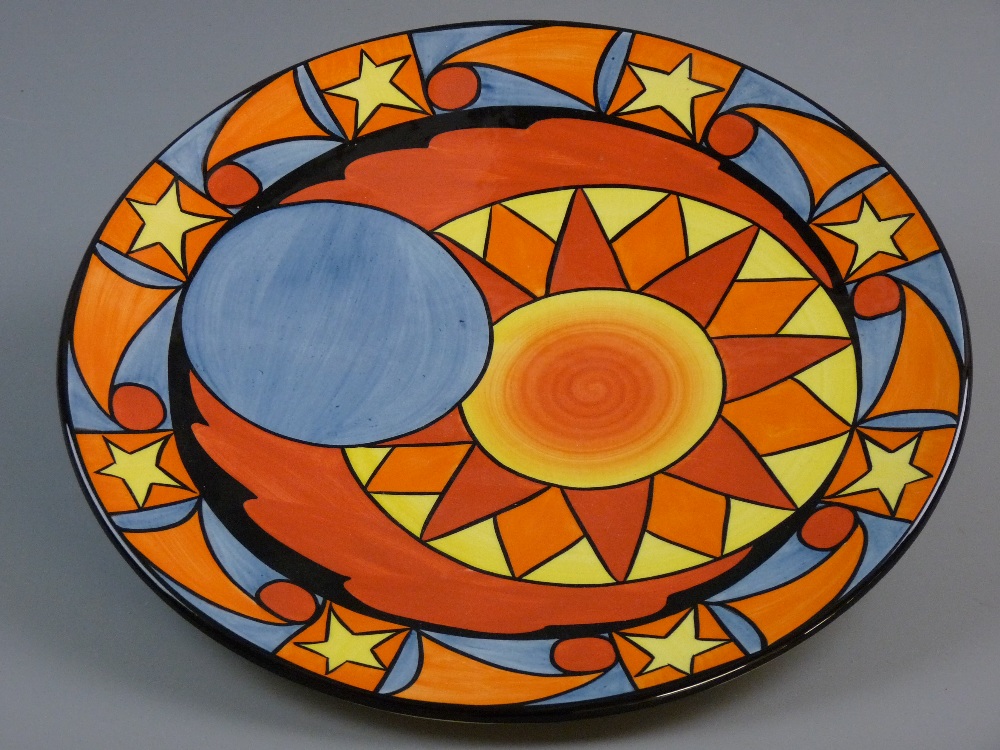 A CIRCULAR LORNA BAILEY 'ECLIPSE' ABSTRACT COLOURFUL CHARGER, limited edition (41/100), 34 cms