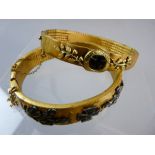 TWO WWI GERMAN PATRIOTIC TRENCH ART BANGLES, gilt metal with leaf and iron cross decoration, one