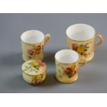 TWO MINIATURE ROYAL WORCESTER MUGS, floral painted (one pink mark and one a green mark), 2.5 cms