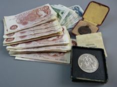 A CASED ROYAL LIFE SAVINGS SOCIETY BRONZE MEDAL 1891, a Festival of Britain 1951 crown in a green