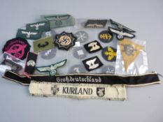 A COLLECTION OF WEHRMACHT UNIFORM BADGES AND INSIGNIA, trade badges and sleeve titles etc along with