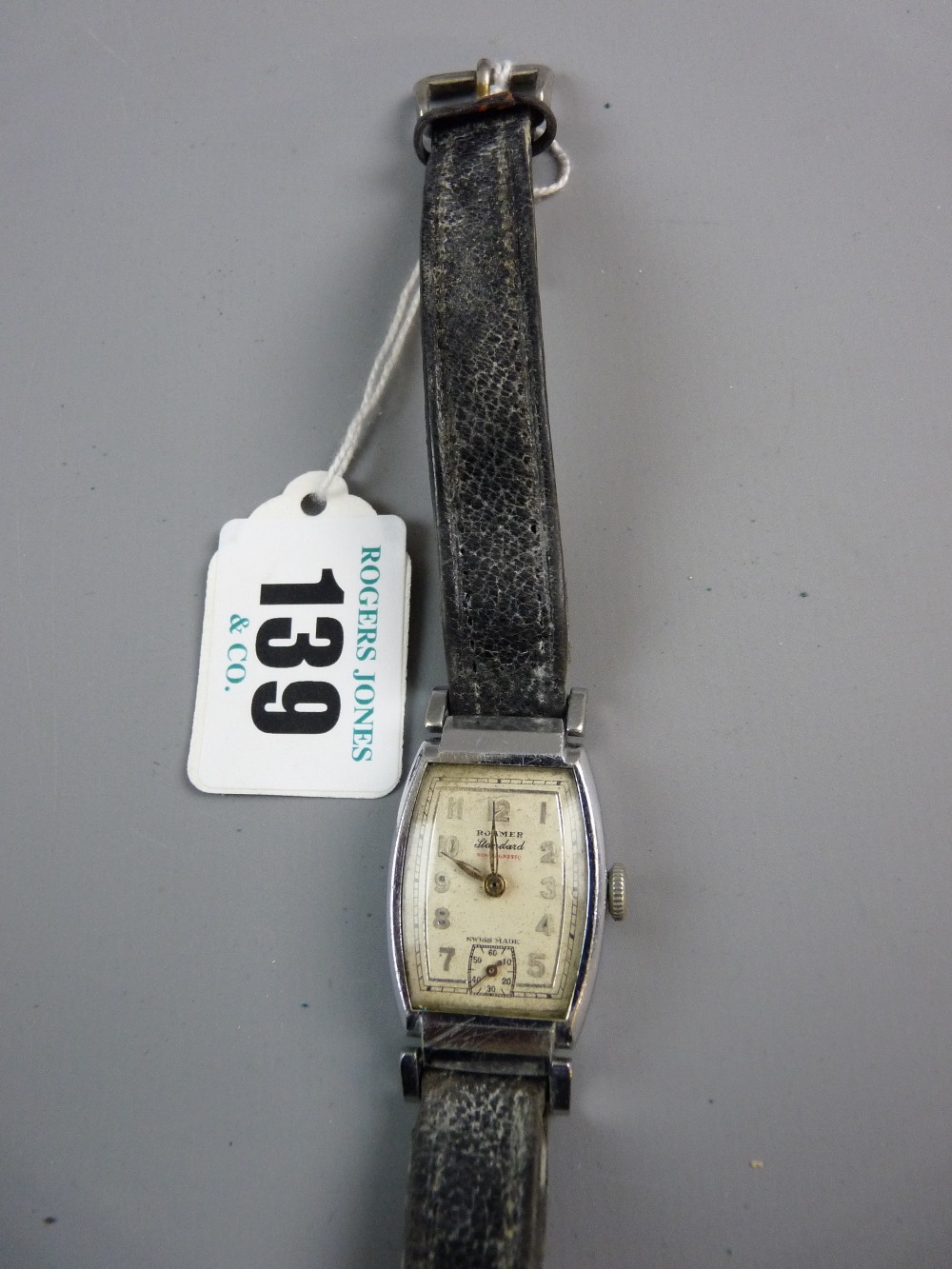 A LADY'S ROAMER STANDARD WRISTWATCH, stainless steel encased having an oblong dial and leather