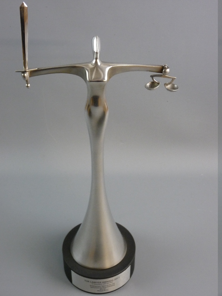 A MODERN STERLING SILVER STATUE of the Scales of Justice for the 2011 Lawyer Awards, presented to
