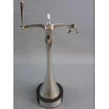 A MODERN STERLING SILVER STATUE of the Scales of Justice for the 2011 Lawyer Awards, presented to