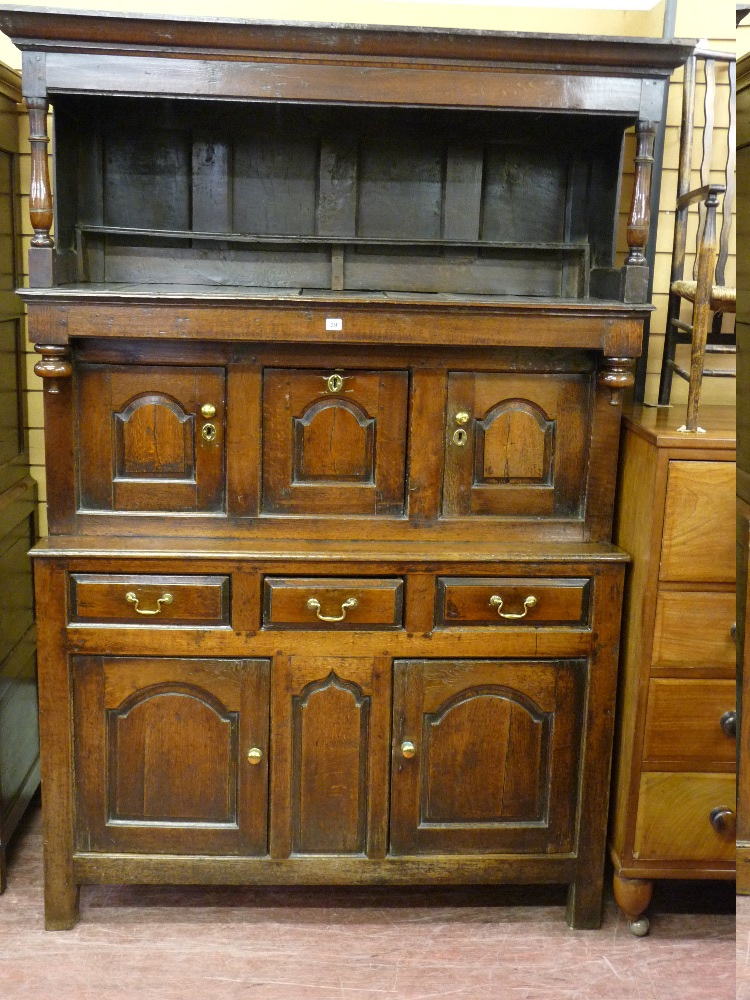 AN 18th CENTURY WELSH OAK TRIDARN, the upper section having a hood with turned pillars and part