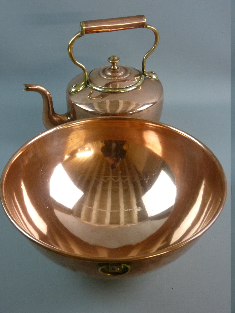 A VICTORIAN COPPER AND BRASS KETTLE AND SPUN COPPER BOWL, the 32 cms diameter bowl with folded rim