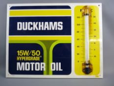 A DUCKHAMS TINWARE THERMOMETER SIGN, 52.5 x 66.5 cms approximately, 15W/50 Hypergrade Motor Oil with