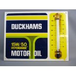 A DUCKHAMS TINWARE THERMOMETER SIGN, 52.5 x 66.5 cms approximately, 15W/50 Hypergrade Motor Oil with